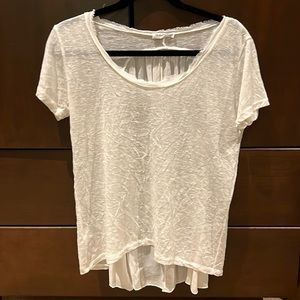 Nina Kendosa white short sleeve shirt